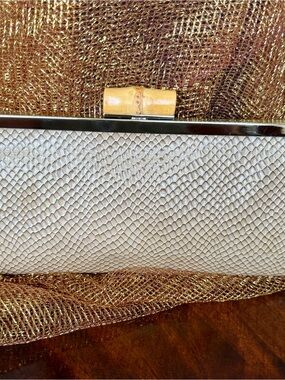 Elegant White Textured Clutch with Bamboo Accent